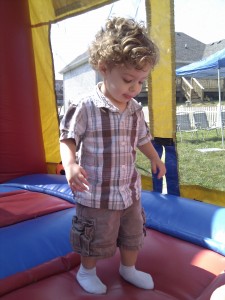 Caleb in the bounce house